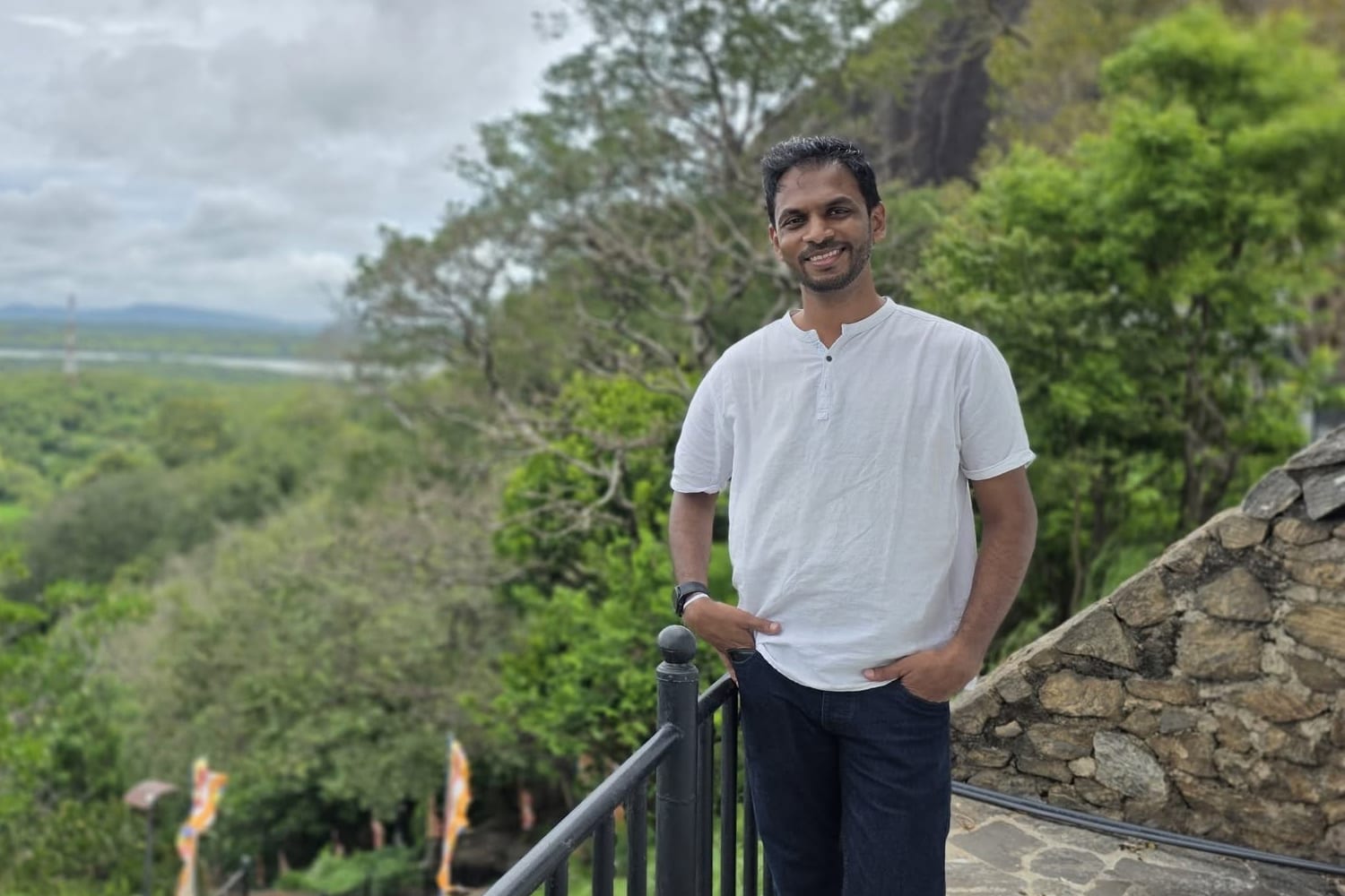 Iranga Basnayake on a hillside overlooking the valley near Kandy, Sri Lanka